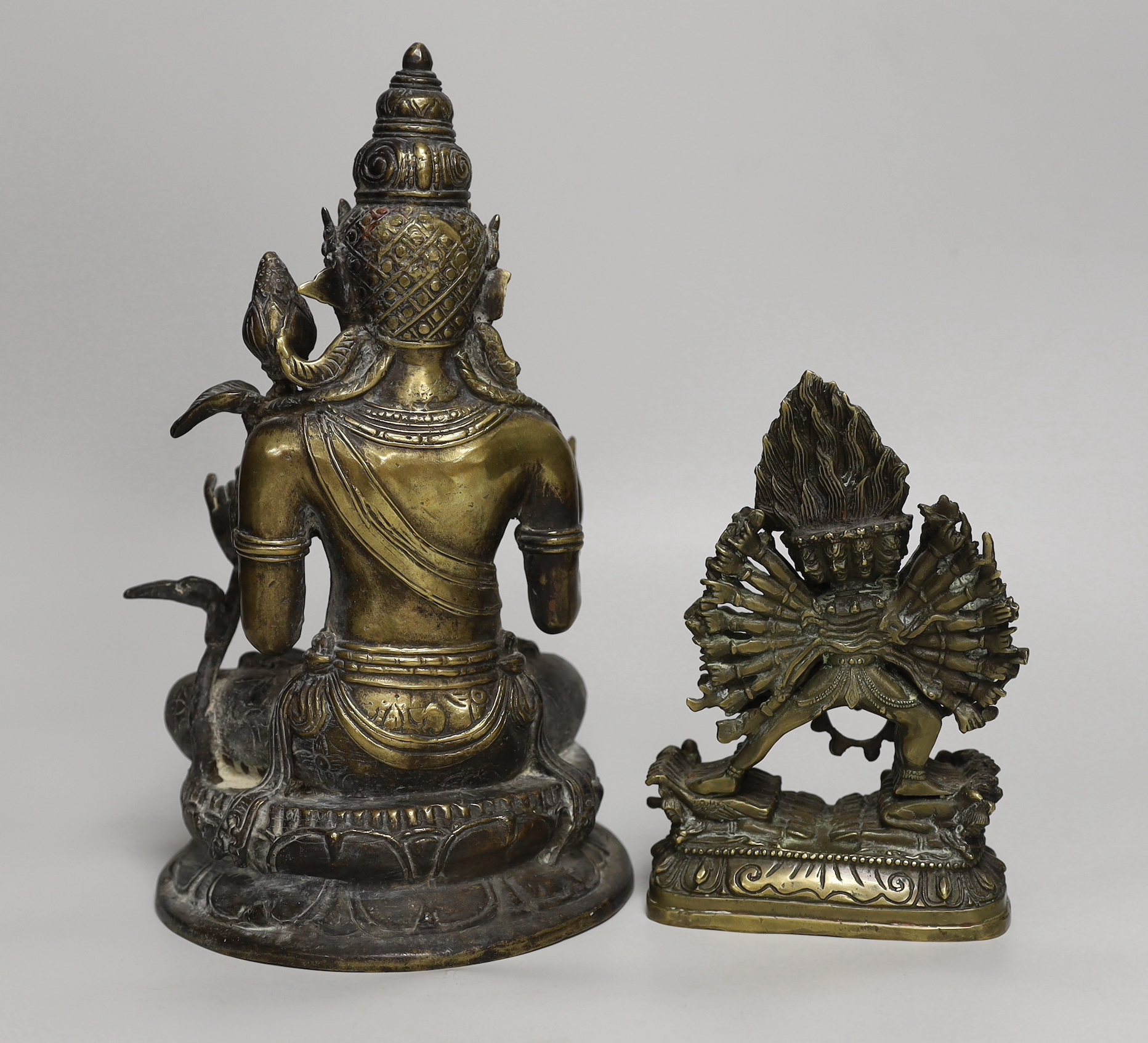 Two Buddhist bronze figures, tallest, 28cm high
